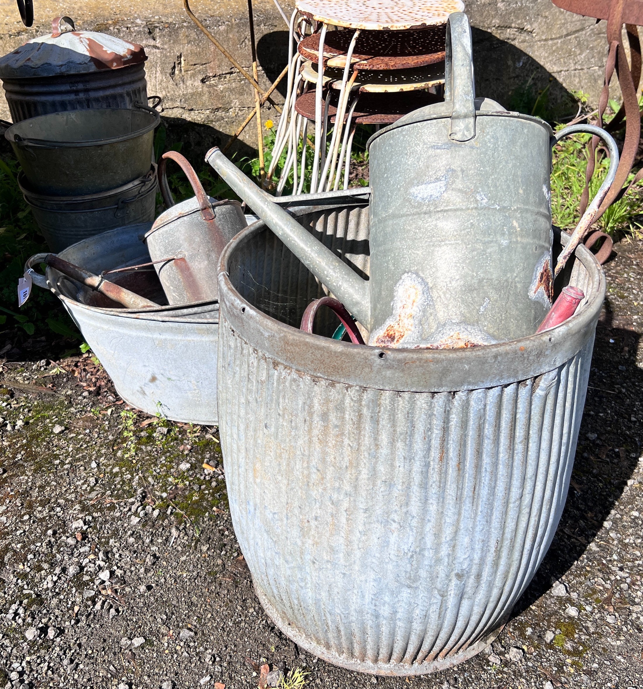 Ten assorted galvanised containers, watering cans, etc. *Please note the sale commences at 9am.